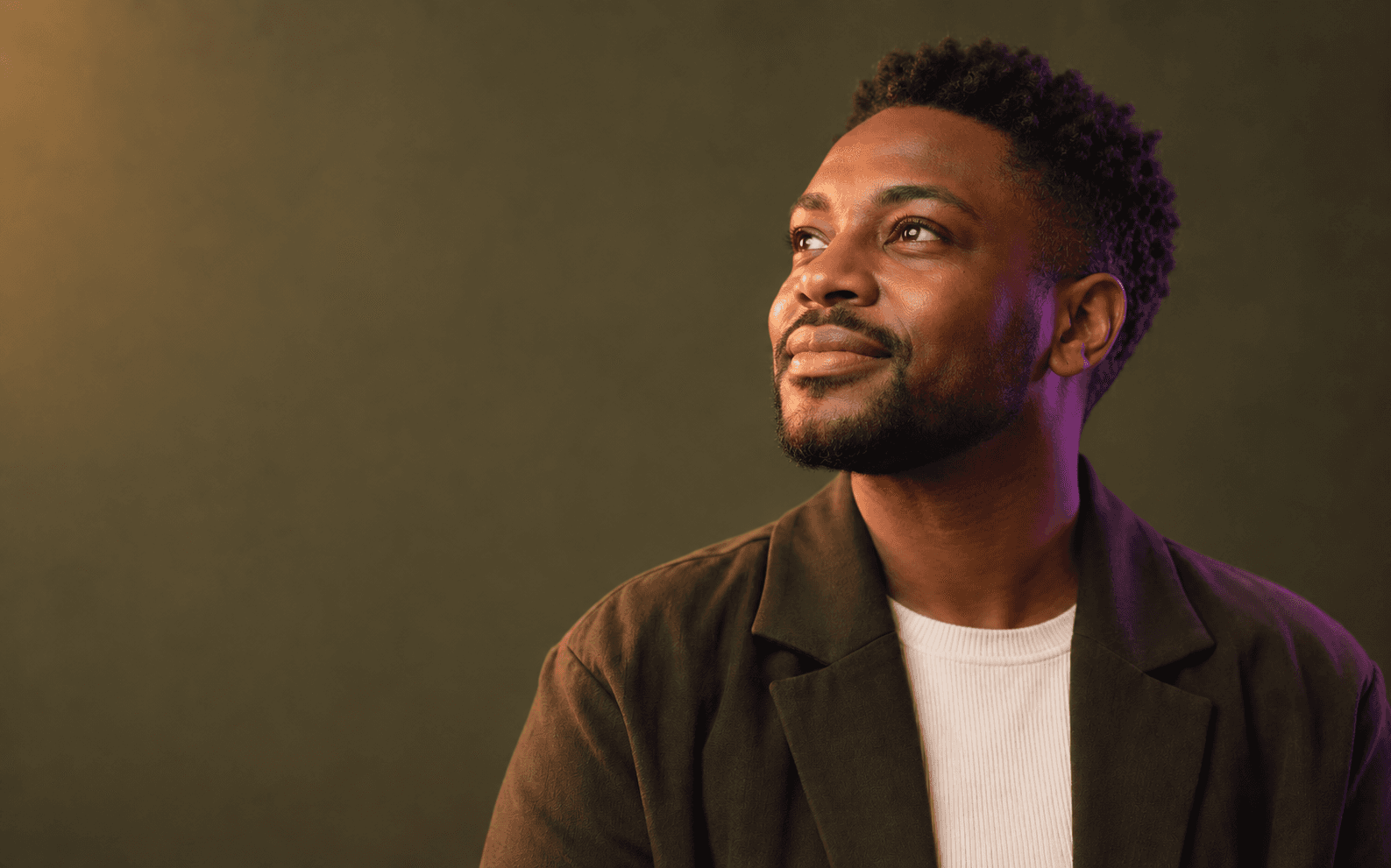 A male professional looking ahead with confidence